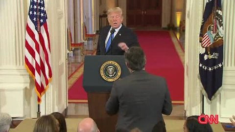 Trump scolds CNN reporter for being rude as WH staffer wrestles microphone away during presser