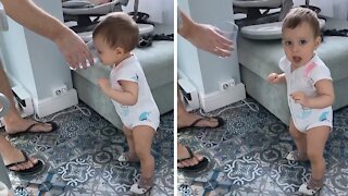 Cute Toddler Enjoys Sipping Her Cold Water