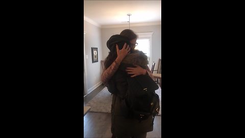 Expecting couple surprise family and friends with pregnancy announcement