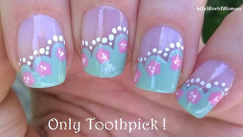Wavy side French manicure with flower design