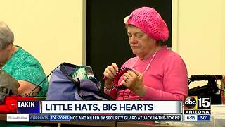 Volunteers make 1,000 tiny hats for babies