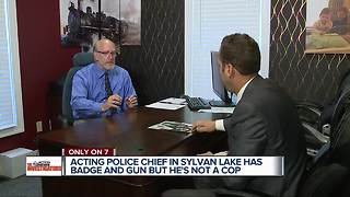 Local Acting Police Chief faces questions about carrying a gun and badge