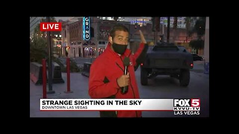 Cameraman captures UFO sighting while filming news broadcast! 2021