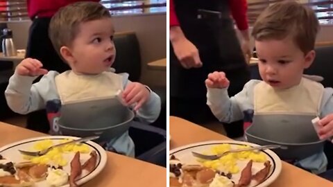 Kid totally freezes when waitstaff sings 'happy birthday' to him