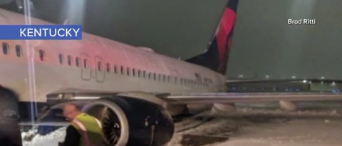 Plane from Vegas slides off runway