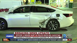 Officer fires gun after being dragged, or hit, by SUV in parking lot