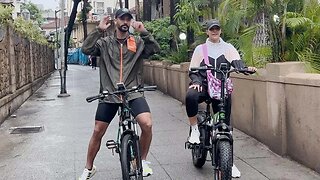 Neha Dhupia with her Husband Angad takes to the streets on her bicycle and enjoys the Mumbai weather