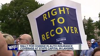 Rally for change in auto insurance coverage at state capital in Lansing