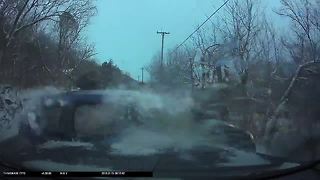Caught on camera: Car slides on black ice, hits Northern Kentucky police cruiser