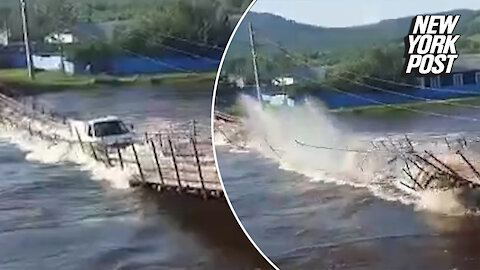 Russian Bridge Collapse Washes Truck Into River