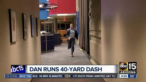 Dan Spindle does the 40-yard dash -- in a suit