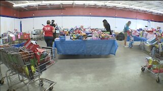 Former Toys for Tots recipient now volunteers to help spread holiday cheer