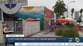 Encinitas business owner says some customers still refuse masks