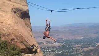 Slackliner falls at dizzying heights