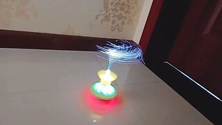 Fiber-Optic Spinning Top
