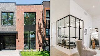 Cette maison à la déco épurée à vendre à Montréal a quasiment le garage dans son salon