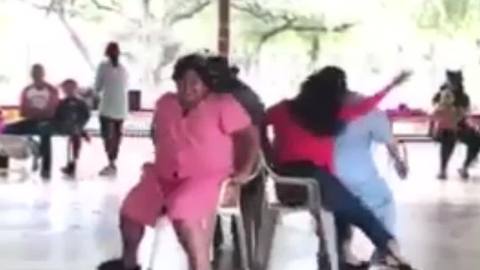 Woman Playing Musical Chairs Breaks The Chair