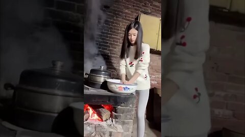 Countryside Chinese Girl Is Kneading Dough For Noodles