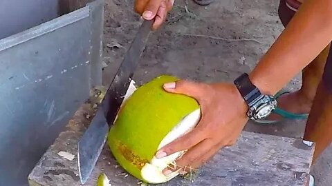 How to Cut a Coconut To Drink Demonstration