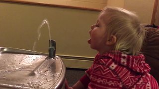 Cute Little Girl Can't Figure out Drinking Fountain