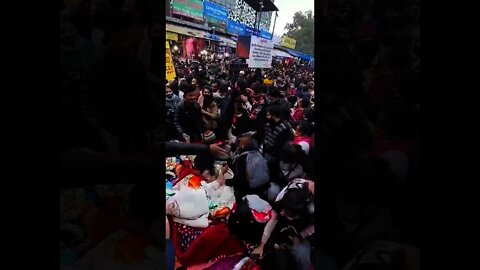 Shoppers jostling for space in Delhi's Sarojini Nagar market, India