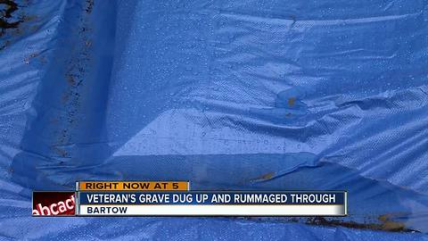 Clothes removed from body of U.S. Veteran buried 19 years ago after someone unearthed his grave
