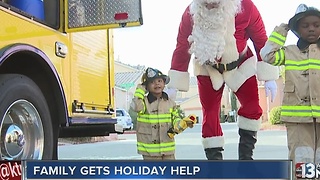 Young fire victims receive presents from fire department