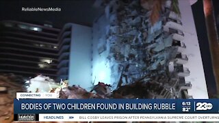 Bodies of two children found in collapsed building rubble