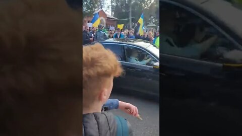 Irish people surround the Russian Ambassador in Dublin yesterday waving Ukrainian flags