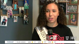 Riverview beauty queen and quarterback works to help community
