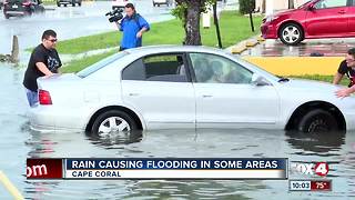 Heavy rain leaves cars flooded