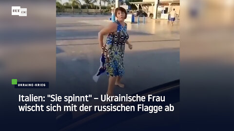 Italien: "Sie spinnt" – Ukrainische Frau wischt sich mit der russischen Flagge ab