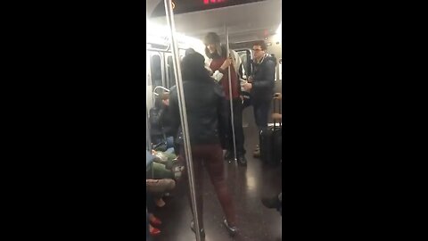 Man smacks this woman that was acting wild on NYC subway. Chaos erupts