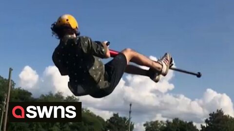US man performs incredible pogo stunts including front flip down flight of 17 STAIRS