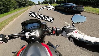 Girl in Lotus Evora Challenges Street Triple 765RS to a Race