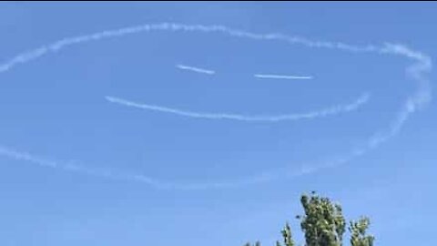 Plane draws giant smiley face in the sky during lockdown