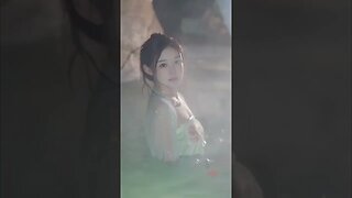 Beautiful Chinese Girl Wades in A Beauty Pool