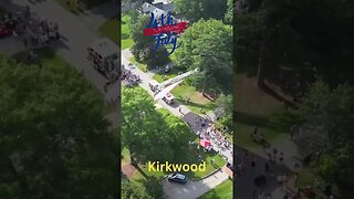 Fourth of July flag raising from above Kirkwood