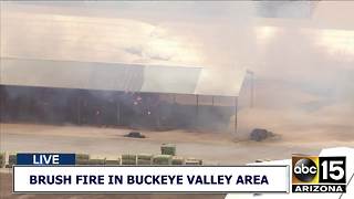 Hay bales burning at farm in Buckeye