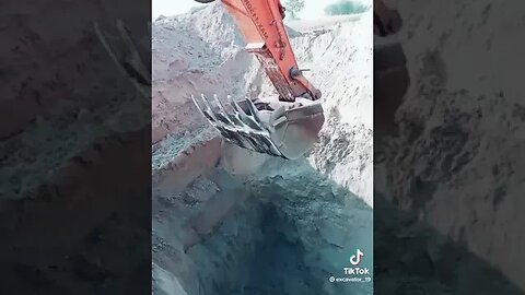 Guy uses his excavator to save a dog stuck in a pit #shorts #rescue