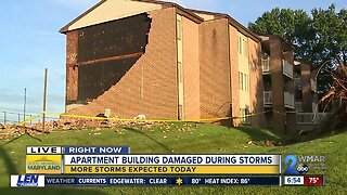 Large hole on the side of an Owings Mills apartment building following severe storm