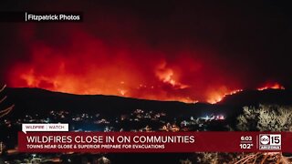 Wildfires close in on Arizona communities