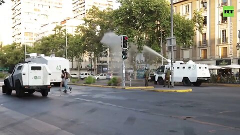 Water Cannon Vs Molotovs: Chileans Protesters Mark Death Of Indigenous ActivistPolice clash