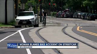 Woman blames bike accident on streetcar