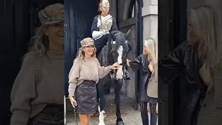 Stylish women pose with kings horse Guard #horseguardsparade