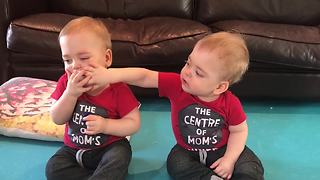 Identical Twins Each Want The Other's Pacifier