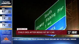Child dies after being hit by a car