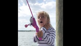 Child is ecstatic as she catches first fish!