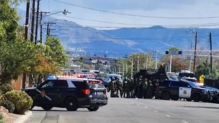 Suspect barricaded in car!