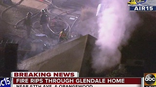 Smoke, flames shoot through windows, doors of Glendale home